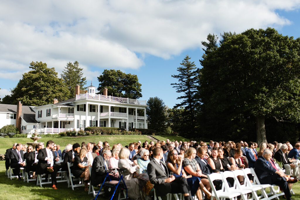 guests seated outside for an elegant ceremony in Upstate New York