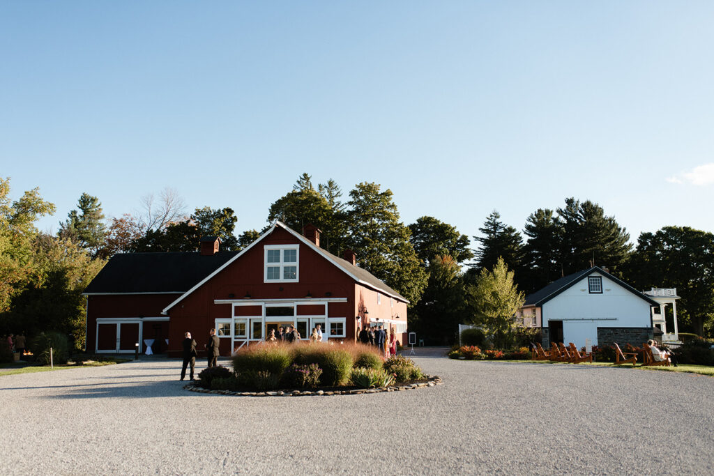 red barn wedding reception venue bathed in sun in Upstate New York