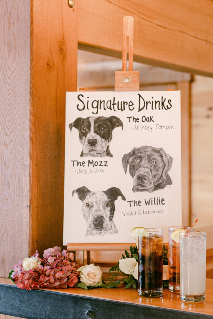 sign on bar with three dog illustrations each featuring a signature drink