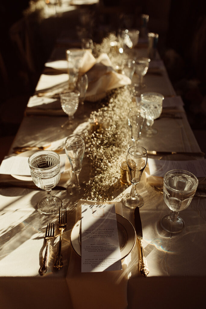 white and gold barn wedding reception decor in upstate new york