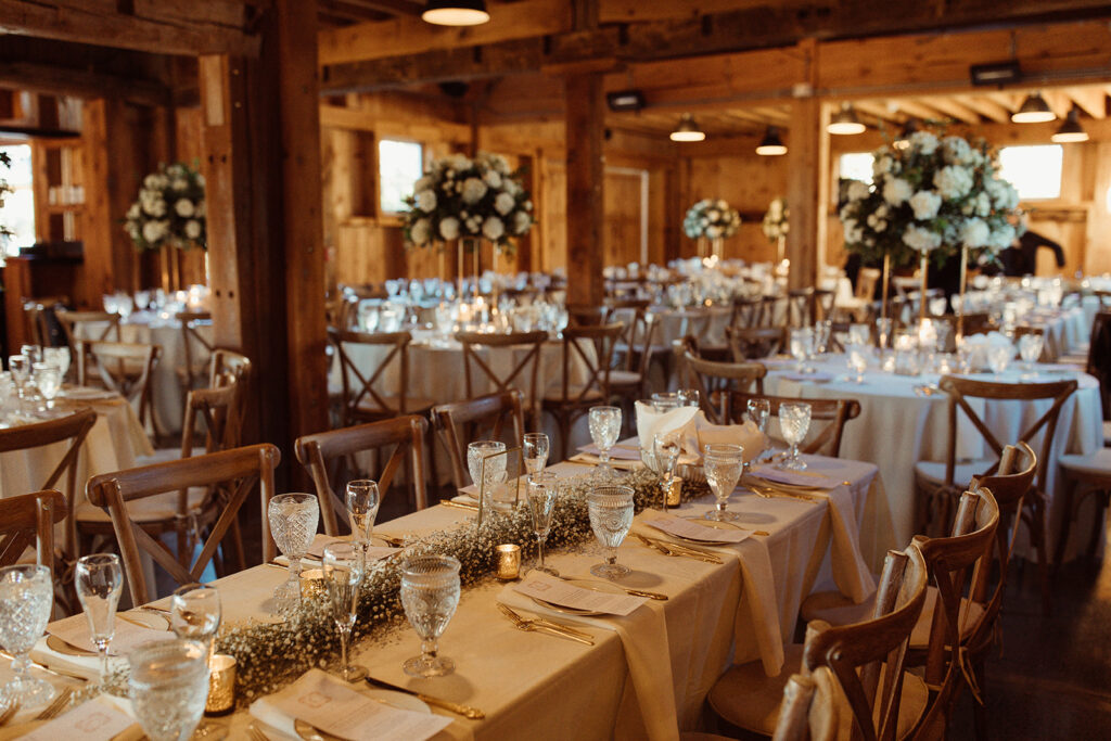 white and gold barn wedding reception decor in upstate new york