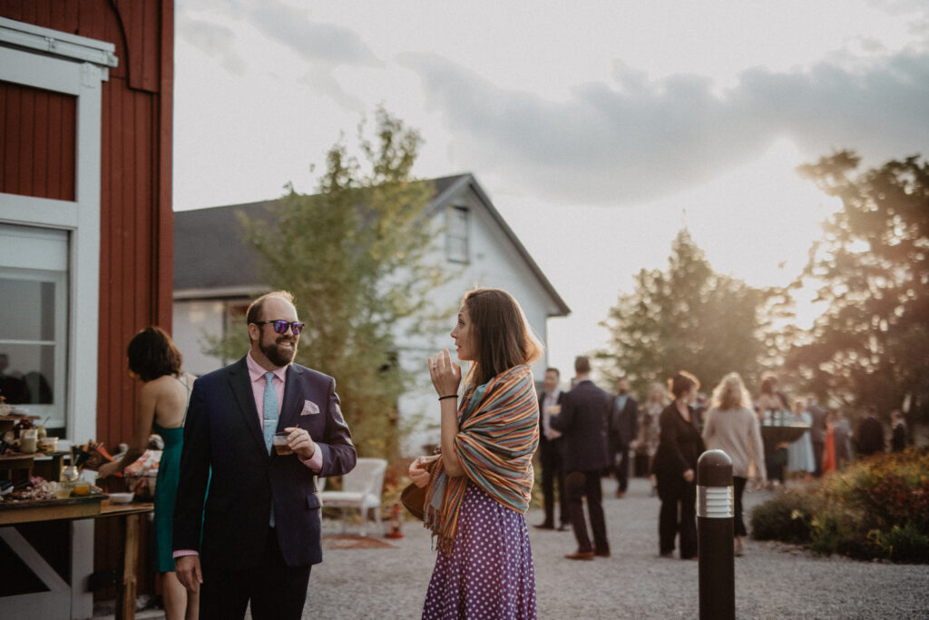 guests outside for cocktail hour at wedding venue in upstate new york