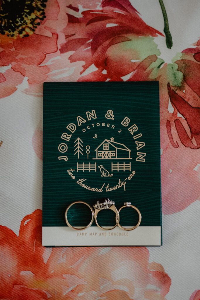 hunter green wedding welcome booklet for weekend wedding in upstate new york