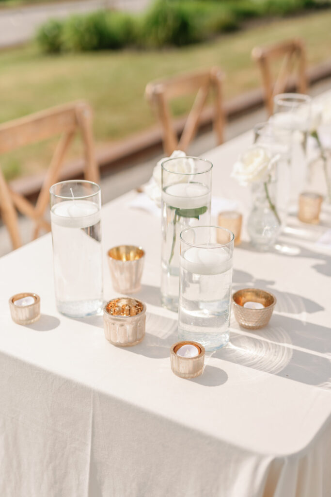 white and gold outdoor event table decor