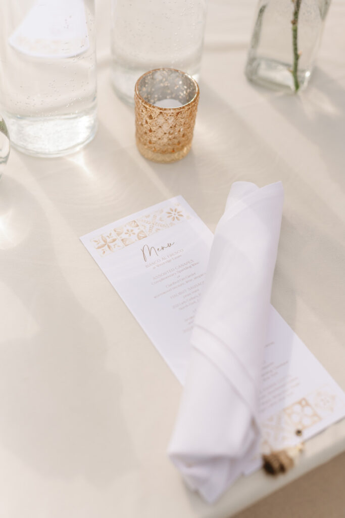 custom watercolor menu with tassel on white velvet linen
